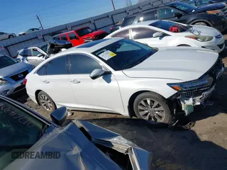 2019 Honda Accord Touring z VIN 1HGCV2F90KA008081, wystawiony jako IAAI lot #41742867 z przebiegiem 105 432 mil mil oraz . Historia ofert i sprzedaży dostępna na DreamBid. Obrazek 13.