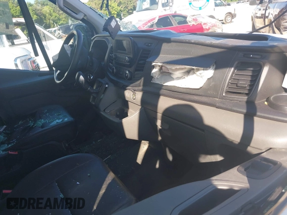 2022 Ford Transit Cargo with VIN 1FTBR3X81NKA63860, listed as a IAAI auction lot 42323904 with 94,473 mi miles and . Bid and sale history available at DreamBid. Image 5.
