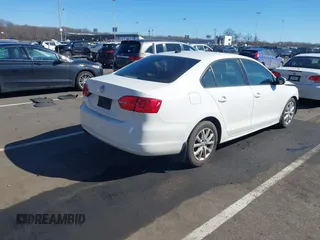 2012 Volkswagen Jetta Sedan SE w/Convenience PZEV with VIN 3VWDP7AJ2CM374783, listed as a IAAI auction lot 41636257 with 124,458 mi miles. Bid and sale history available at carsss.com. Image 4.