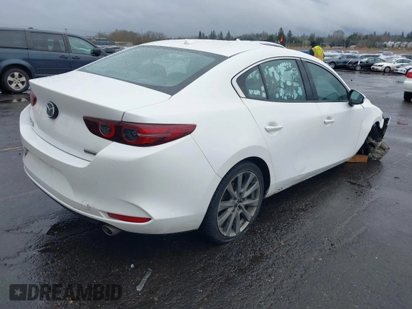 2020 Mazda 3 Premium with VIN 3MZBPBEMXLM133357, listed as a IAAI auction lot 41540234 with 81,280 mi miles and . Bid and sale history available at DreamBid. Image 4.