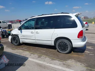 1999 Dodge Caravan z VIN 1B4GP45G2XB554868, wystawiony jako IAAI lot #41882038 z przebiegiem 130 743 mil mil oraz . Historia ofert i sprzedaży dostępna na DreamBid. Obrazek 14.