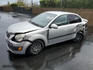 2009 Kia Rio SX with VIN KNADE223796467610, listed as a Copart auction lot 51490005 with 98,042 mi miles and Salvage Title. Bid and sale history available at carsss.com. Image 1.
