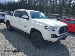 2023 Toyota Tacoma SR with VIN 3TMCZ5AN8PM632794, listed as a IAAI auction lot 42246826 with 26,988 mi miles and . Bid and sale history available at DreamBid. Image 1.