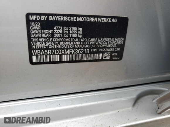 2021 BMW 3 Series 330i xDrive with VIN WBA5R7C0XMFK36218, listed as a Copart auction lot 62274005 with 47,467 mi miles and Salvage title. Bid and sale history available at DreamBid. Image 12.