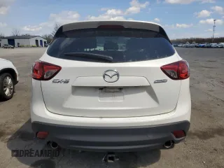 2016 Mazda CX-5 Grand Touring z VIN JM3KE2DY9G0645141, wystawiony jako Copart lot #50989635 z przebiegiem 123 898 mil mil oraz Szkoda całkowita • Salvage title. Historia ofert i sprzedaży dostępna na DreamBid. Obrazek 6.
