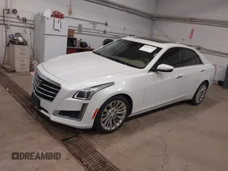 2016 Cadillac CTS Luxury Collection AWD with VIN 1G6AX5SS6G0125285, listed as a IAAI auction lot 42137355 with 110,299 mi miles and . Bid and sale history available at DreamBid. Image 2.