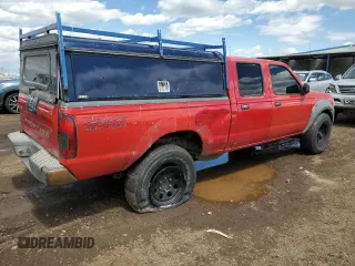 2002 Nissan Frontier XE z VIN 1N6ED29Y12C388949, wystawiony jako Copart lot #55235875 z przebiegiem 212 944 mil mil oraz Szkody całkowita. Historia ofert i sprzedaży dostępna na DreamBid. Obrazek 3.