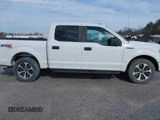 2019 Ford F-150 XL with VIN 1FTEW1E51KFC52807, listed as a IAAI auction lot 41383212 with 124,244 mi miles and . Bid and sale history available at DreamBid. Image 13.