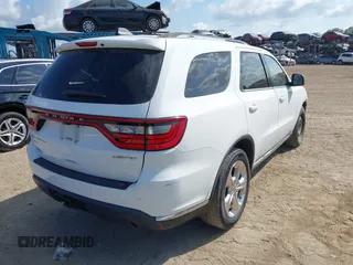 2014 Dodge Durango Limited with VIN 1C4RDJDGXEC323129, listed as a IAAI auction lot 42318727 with 148,451 mi miles and . Bid and sale history available at DreamBid. Image 4.