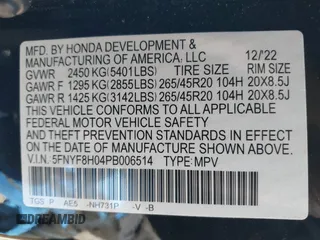 2023 Honda Passport Elite with VIN 5FNYF8H04PB006514, listed as a IAAI auction lot 41537826 with 14,640 mi miles and . Bid and sale history available at DreamBid. Image 9.
