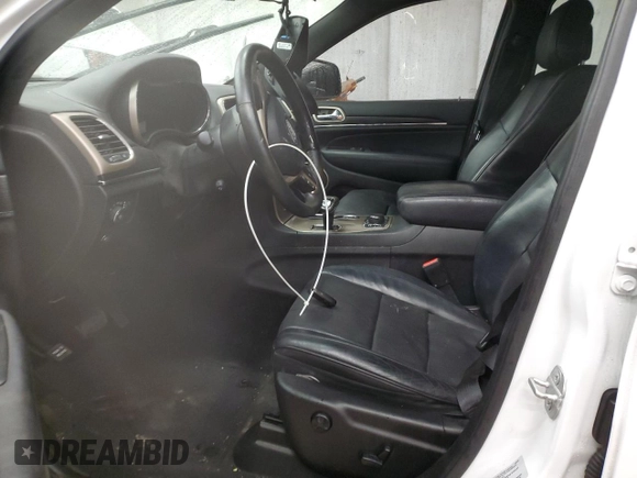 2015 Jeep Grand Cherokee Summit with VIN 1C4RJFJG9FC794992, listed as a Copart auction lot 42790355 with 74,044 mi miles and Salvage Title. Bid and sale history available at DreamBid. Image 7.