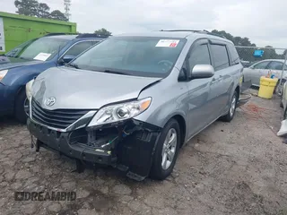 2013 Toyota Sienna LE AAS with VIN 5TDKK3DC5DS367505, listed as a IAAI auction lot 40373684 with 102,521 mi miles. Bid and sale history available at carsss.com. Image 2.
