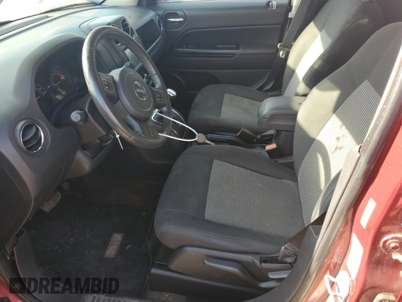 2014 Jeep Patriot Latitude with VIN 1C4NJRFB3ED792919, listed as a Copart auction lot 66043945 with 142,224 mi miles and Salvage title. Bid and sale history available at DreamBid. Image 7.