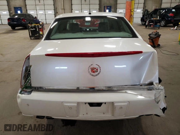 2008 Cadillac DTS 1SA z VIN 1G6KD57Y08U136593, wystawiony jako Copart lot #49208925 z przebiegiem 145 099 mil mil oraz Szkoda całkowita • Salvage title. Historia ofert i sprzedaży dostępna na DreamBid. Obrazek 6.