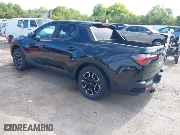 2022 Hyundai Santa Cruz SEL with VIN 5NTJBDAE2NH000464, listed as a IAAI auction lot 42329921 with 32,890 mi miles and . Bid and sale history available at DreamBid. Image 3.