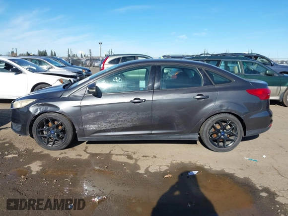 2016 Ford Focus SE z VIN 1FADP3F27GL321507, wystawiony jako IAAI lot #41278203 z przebiegiem 157 910 mil mil oraz . Historia ofert i sprzedaży dostępna na DreamBid. Obrazek 14.