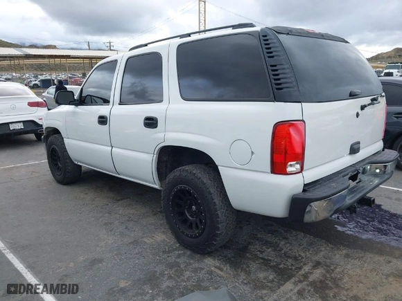 2005 Chevrolet Tahoe LS with VIN 1GNEC13V85J243672, listed as a IAAI auction lot 41801268 with 202,624 mi miles. Bid and sale history available at carsss.com. Image 3.