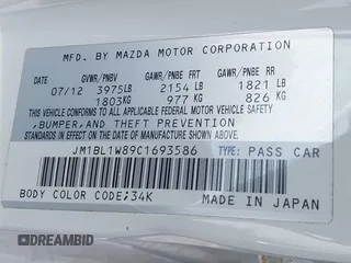 2012 Mazda 3 i Grand Touring with VIN JM1BL1W89C1693586, listed as a IAAI auction lot 41846392 with 110,400 mi miles and . Bid and sale history available at DreamBid. Image 9.