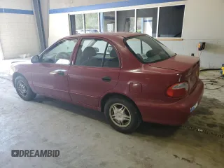 1999 Hyundai Accent z VIN KMHVF24N5XU575750, wystawiony jako Copart lot #52190805 z przebiegiem 205 655 mil mil oraz Tytuł czysty. Historia ofert i sprzedaży dostępna na DreamBid. Obrazek 2.