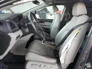 2019 Honda Odyssey EX-L with VIN 5FNRL6H71KB126181, listed as a Copart auction lot 77083064 with 48,590 mi miles and Salvage Title. Bid and sale history available at DreamBid. Image 7.