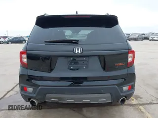 2023 Honda Passport TrailSport with VIN 5FNYF8H67PB006933, listed as a IAAI auction lot 41597859 with 34,145 mi miles and . Bid and sale history available at carsss.com. Image 17.