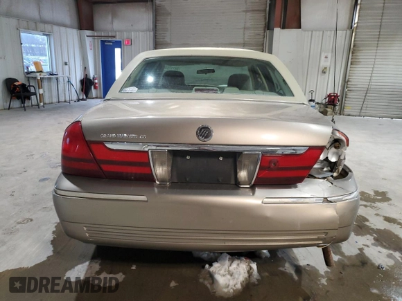 2005 Mercury Grand Marquis GS with VIN 2MEFM74WX5X614325, listed as a Copart auction lot 88117535 with 128,975 mi miles and Clean Title. Bid and sale history available at DreamBid. Image 6.