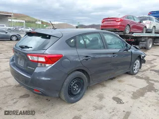 2019 Subaru Impreza with VIN 4S3GTAA60K3758517, listed as a IAAI auction lot 41930668 with 39,999 mi miles. Bid and sale history available at carsss.com. Image 4.