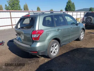 2014 Subaru Forester Premium with VIN JF2SJAEC2EH445669, listed as a IAAI auction lot 42772336 with 103,983 mi miles and . Bid and sale history available at DreamBid. Image 4.