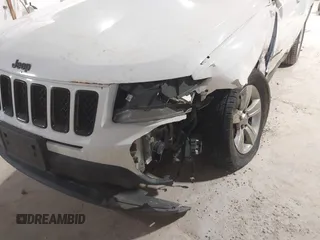 2012 Jeep Compass Latitude with VIN 1C4NJDEB0CD676725, listed as a IAAI auction lot 41948874 with 143,833 mi miles. Bid and sale history available at carsss.com. Image 6.