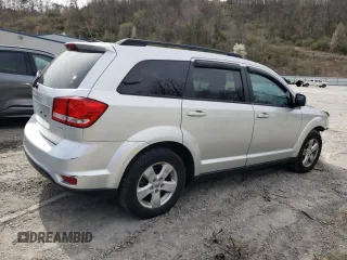 2012 Dodge Journey SXT с VIN 3C4PDDBG2CT323770, выставлен на аукционе Copart как лот 48722225 с пробегом 141 032 миль миль и Списание • Salvage title. История ставок и продаж доступна на DreamBid. Изображение 3.