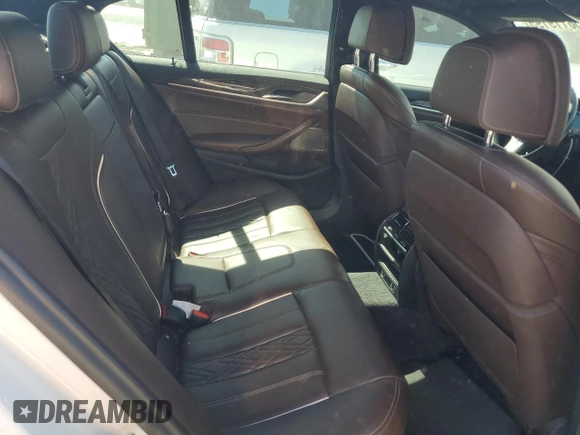 2018 BMW 5 Series 540i xDrive with VIN WBAJE7C52JG891212, listed as a Copart auction lot 58119195 with 73,770 mi miles and Salvage title. Bid and sale history available at DreamBid. Image 10.