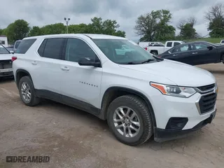 2021 Chevrolet Traverse LS with VIN 1GNERFKW7MJ162246, listed as a IAAI auction lot 39765126 with 76,406 mi miles. Bid and sale history available at carsss.com. Image 1.