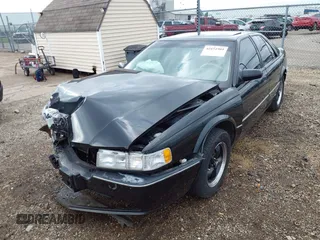 1994 Cadillac Seville STS z VIN 1G6KY5296RU823387, wystawiony jako IAAI lot #42151901 z przebiegiem 165 918 mil mil oraz . Historia ofert i sprzedaży dostępna na DreamBid. Obrazek 18.