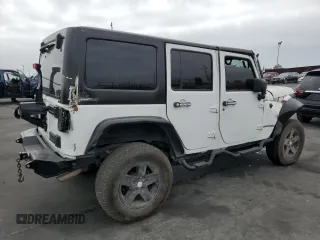2018 Jeep Wrangler Unlimited Sport S with VIN 1C4BJWDG9JL887033, listed as a Copart auction lot 61785565 with 66,725 mi miles and Salvage title. Bid and sale history available at DreamBid. Image 3.