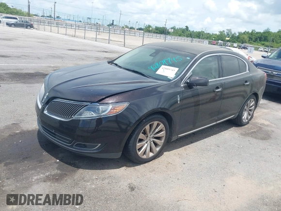 2014 Lincoln MKS with VIN 1LNHL9DK0EG605429, listed as a IAAI auction lot 42809745 with 127,038 mi miles and . Bid and sale history available at DreamBid. Image 14.