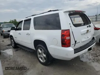 2011 Chevrolet Suburban LT with VIN 1GNSKJE3XBR392454, listed as a Copart auction lot 54828104 with 207,113 mi miles and Salvage Title. Bid and sale history available at carsss.com. Image 2.