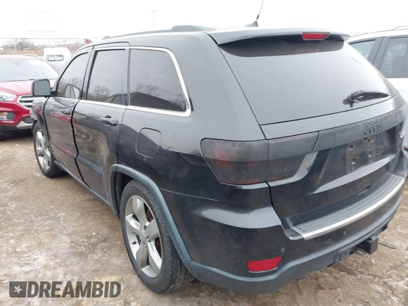2013 Jeep Grand Cherokee Overland with VIN 1C4RJFCG1DC593890, listed as a IAAI auction lot 41264434 with 204,324 mi miles. Bid and sale history available at carsss.com. Image 3.