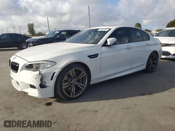 2013 BMW M5 with VIN WBSFV9C56DD096389, listed as a Copart auction lot 44951815 with 123,256 mi miles and Salvage Title. Bid and sale history available at carsss.com. Image 1.