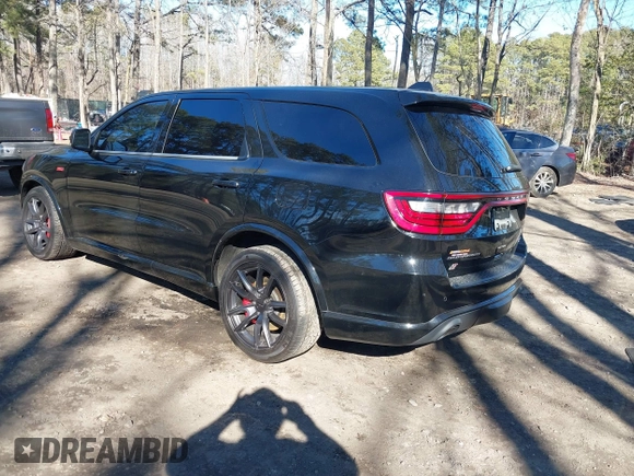 2018 Dodge Durango SRT with VIN 1C4SDJGJ6JC416538, listed as a IAAI auction lot 41440038 with 67,650 mi miles and . Bid and sale history available at DreamBid. Image 3.