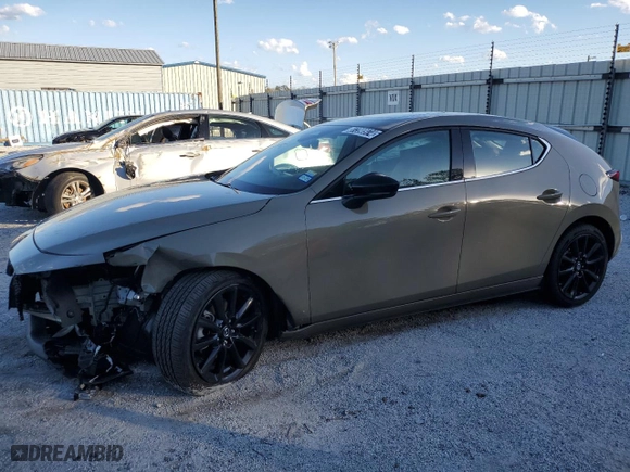 2024 Mazda Mazda3 Hatchback 2.5 Carbon Turbo with VIN JM1BPBYY5R1701036, listed as a Copart auction lot 87390974 with 0 mi miles and Salvage Title. Bid and sale history available at carsss.com. Image 1.