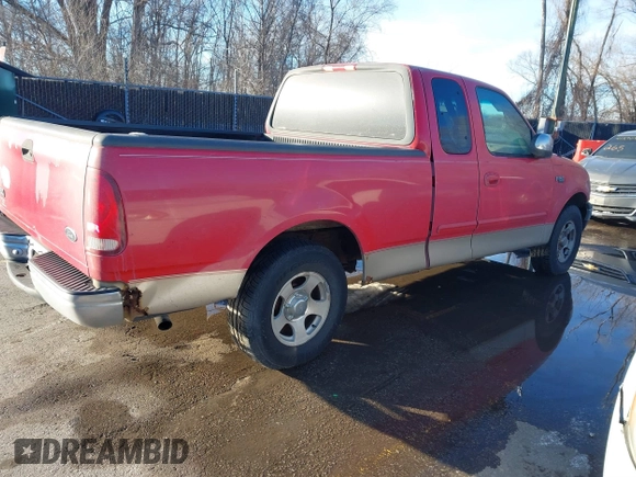 2000 Ford F-150 XL with VIN 1FTZX1724YKB03258, listed as a IAAI auction lot 41356935 with 208,570 mi miles. Bid and sale history available at carsss.com. Image 4.