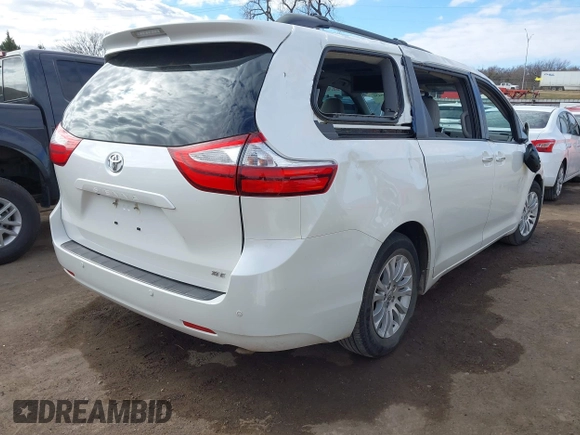 2016 Toyota Sienna XLE with VIN 5TDYK3DC8GS738204, listed as a IAAI auction lot 41105430 with 109,248 mi miles. Bid and sale history available at carsss.com. Image 4.