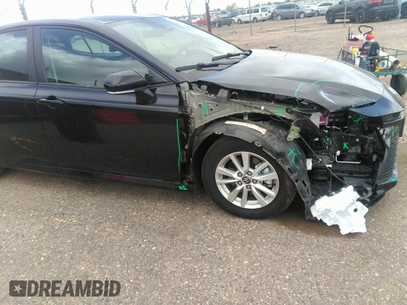 2025 Toyota Camry LE with VIN 4T1DAACK0SU509160, listed as a IAAI auction lot 42141098 with 17,028 mi miles and . Bid and sale history available at DreamBid. Image 6.
