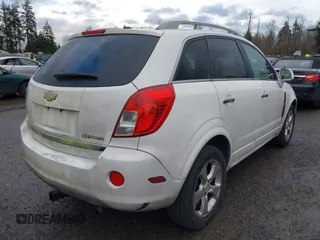 2014 Chevrolet Captiva Sport LT z VIN 3GNAL3EK3ES668745, wystawiony jako IAAI lot #41664373 z przebiegiem 227 422 mil mil oraz . Historia ofert i sprzedaży dostępna na DreamBid. Obrazek 4.