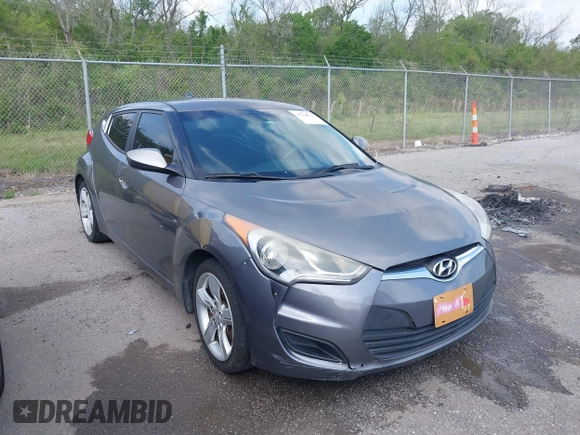 2013 Hyundai Veloster w/Black Int with VIN KMHTC6AD6DU169765, listed as a IAAI auction lot 41928516 with 130,708 mi miles and . Bid and sale history available at DreamBid. Image 1.