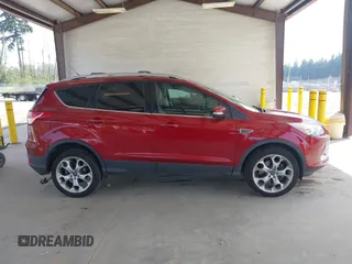 2013 Ford Escape Titanium with VIN 1FMCU9J97DUA29508, listed as a IAAI auction lot 42486296 with 118,537 mi miles and . Bid and sale history available at DreamBid. Image 14.
