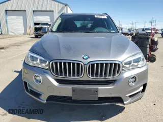 2014 BMW X5 xDrive35i z VIN 5UXKR0C50E0H23037, wystawiony jako Copart lot #56145725 z przebiegiem 82 955 mil mil oraz Szkody całkowita. Historia ofert i sprzedaży dostępna na DreamBid. Obrazek 5.