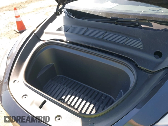 2024 Tesla Model Y with VIN 7SAYGDED8RF213796, listed as a IAAI auction lot 41634130 with 7,710 mi miles and . Bid and sale history available at DreamBid. Image 10.