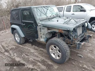 2011 Jeep Wrangler Sport with VIN 1J4AA2D18BL588273, listed as a IAAI auction lot 41857858 with 136,473 mi miles and . Bid and sale history available at carsss.com. Image 1.