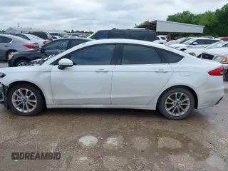 2020 Ford Fusion SE with VIN 3FA6P0H76LR154018, listed as a IAAI auction lot 42175889 with 65,187 mi miles and . Bid and sale history available at DreamBid. Image 15.